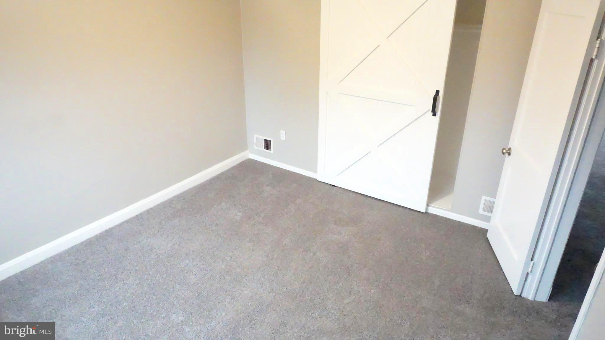 8155 Kavanagh Road Baltimore, MD 21222 - Photo 7 of 24 Bedroom #2 w/Barn Door Closet