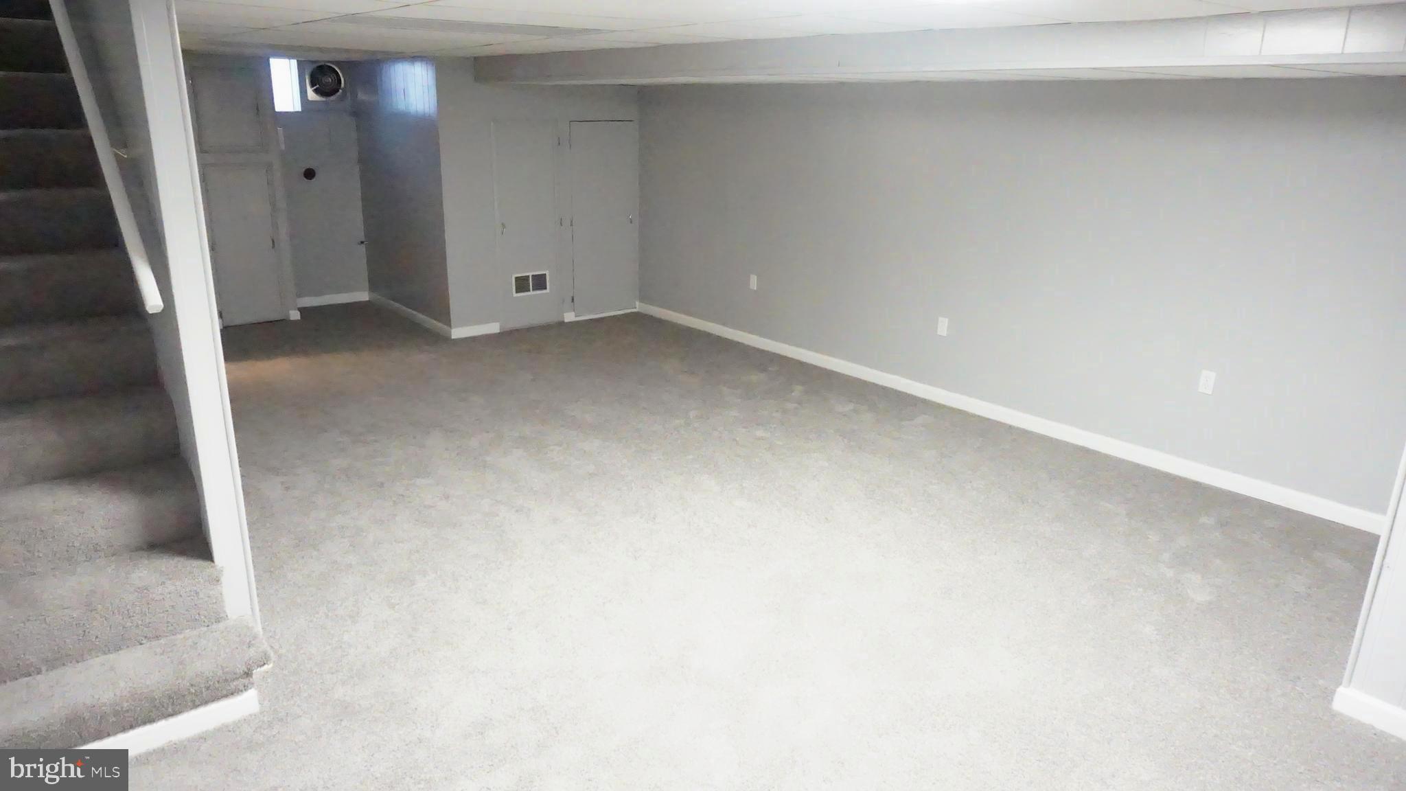 8155 Kavanagh Road Baltimore, MD 21222 - Photo 9 of 24 Fully Finished Basement. New Carpet Throughout