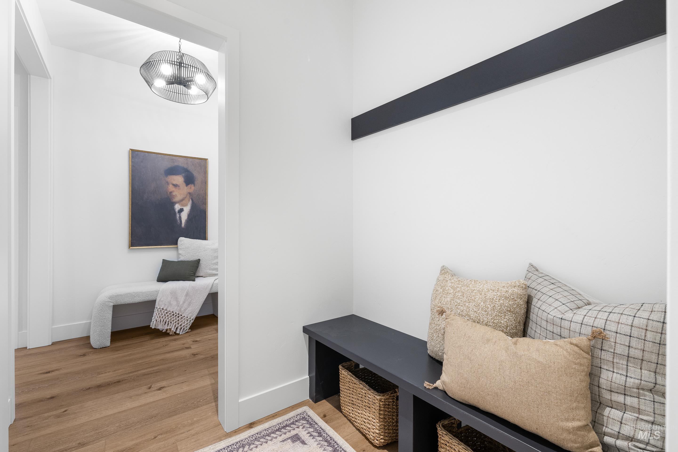 3071 North Lapis Avenue Meridian, ID 83646 - Photo 41 of 50 Mudroom featuring light wood-style flooring and baseboards