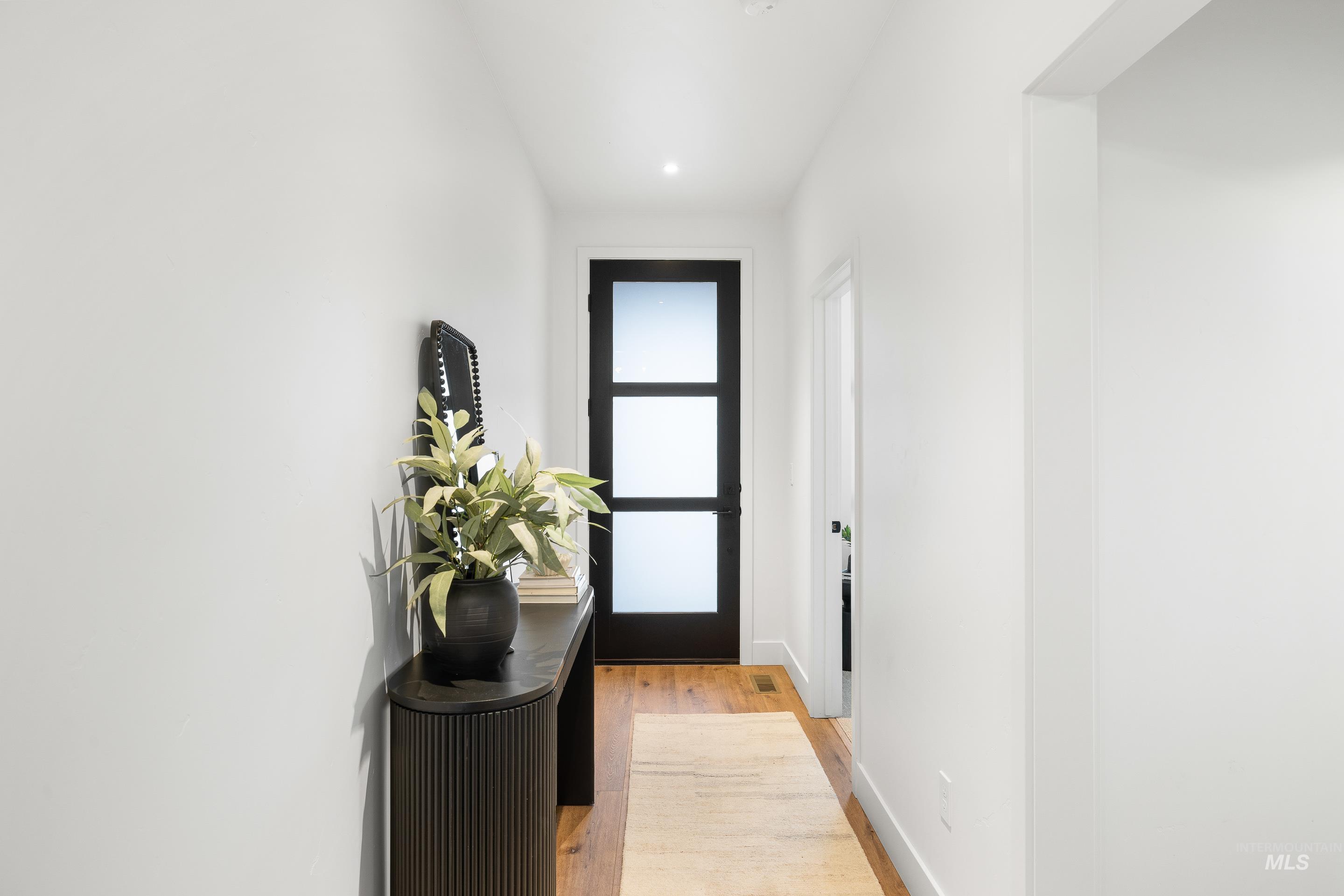 3071 North Lapis Avenue Meridian, ID 83646 - Photo 5 of 50 Entryway featuring wood finished floors and recessed lighting