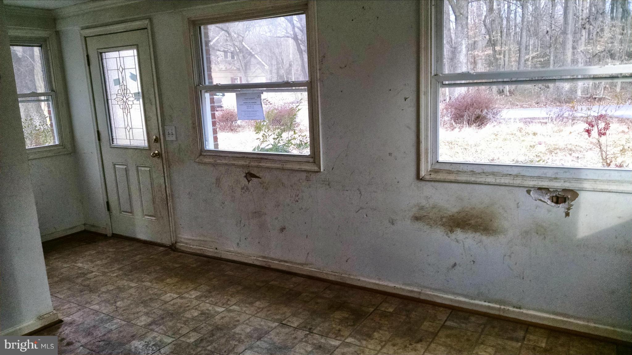 1249 Wrighton Road Lothian, MD 20711 - Photo 2 of 12 an empty room with windows