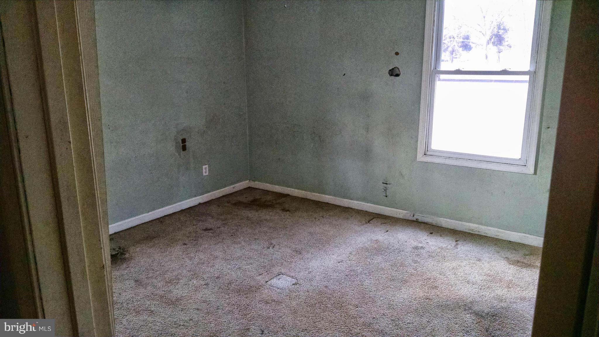 1249 Wrighton Road Lothian, MD 20711 - Photo 6 of 12 a room that has a window in it
