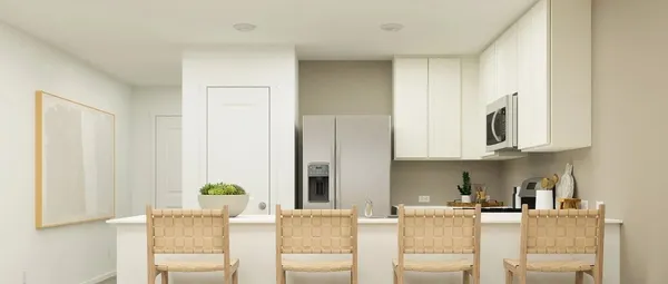 a dining room with furniture and a window