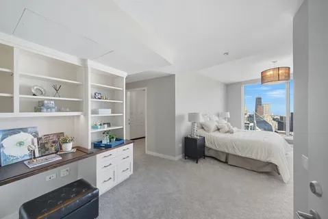 a bed room with furniture and decor