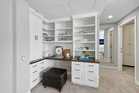 a kitchen with stainless steel appliances a refrigerator and a stove top oven