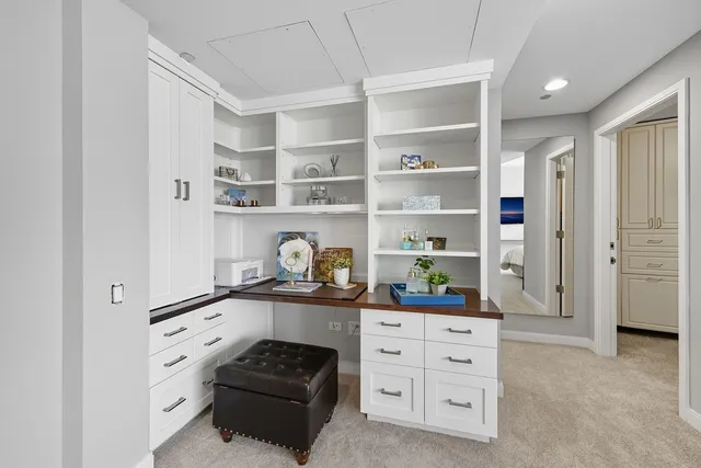 a kitchen with stainless steel appliances a refrigerator and a stove top oven