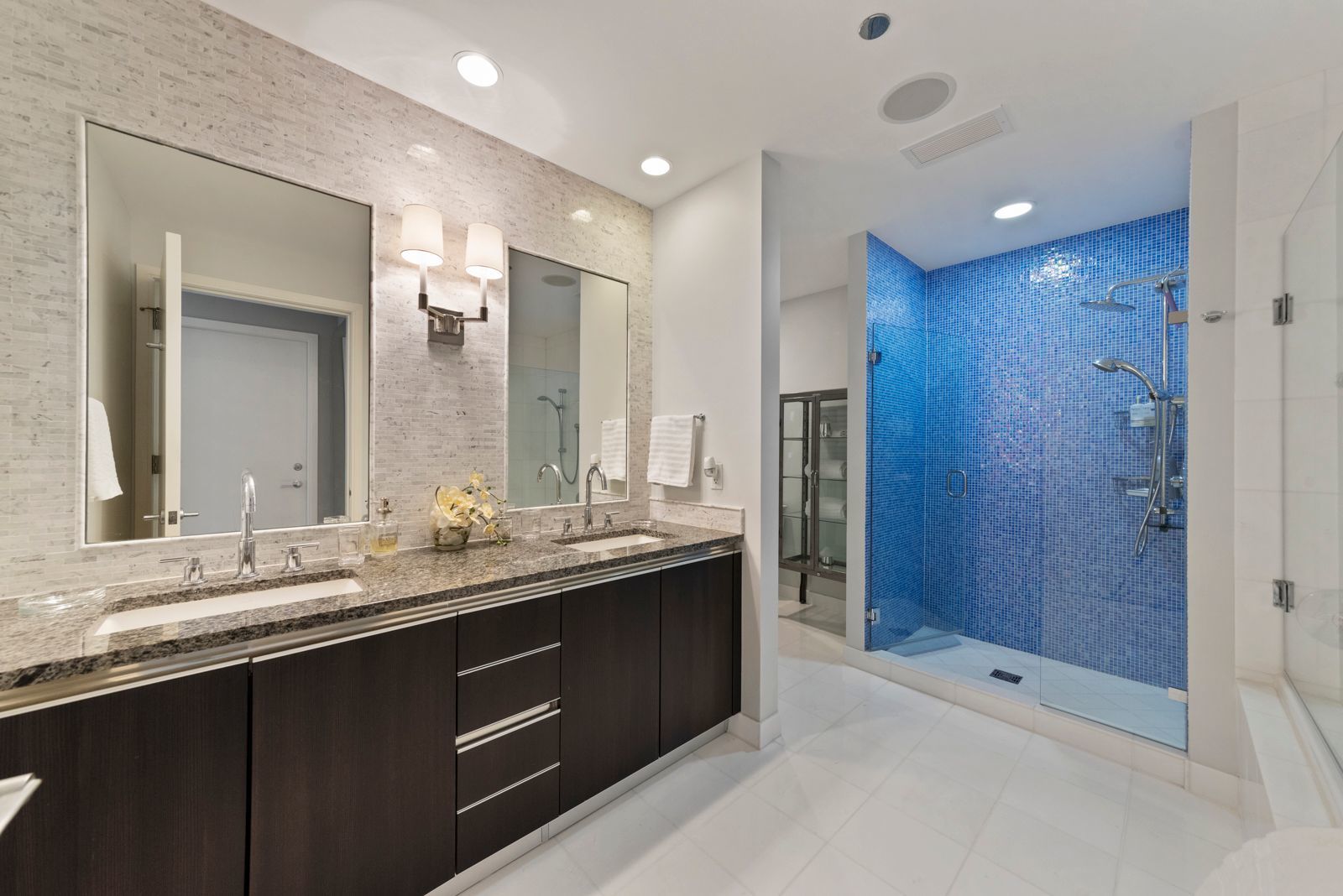 60 East Monroe Street, Unit 5601 Chicago, IL 60603 - Photo 18 of 50 a bathroom with double sink and a mirror