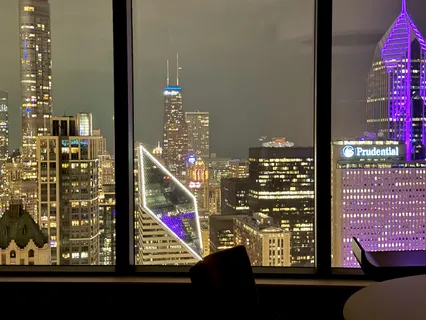 a view of a living room and bedroom