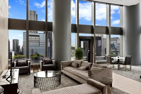 a view of a balcony with chairs