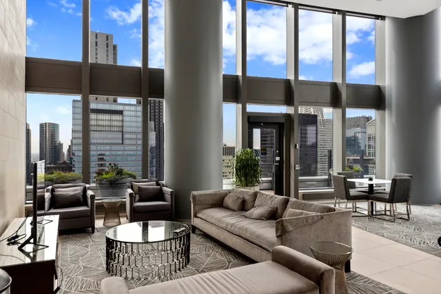 a view of a balcony with chairs