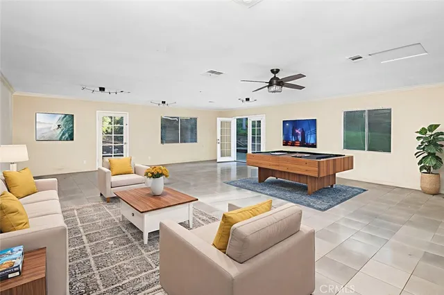 a kitchen with granite countertop a stove sink and cabinets