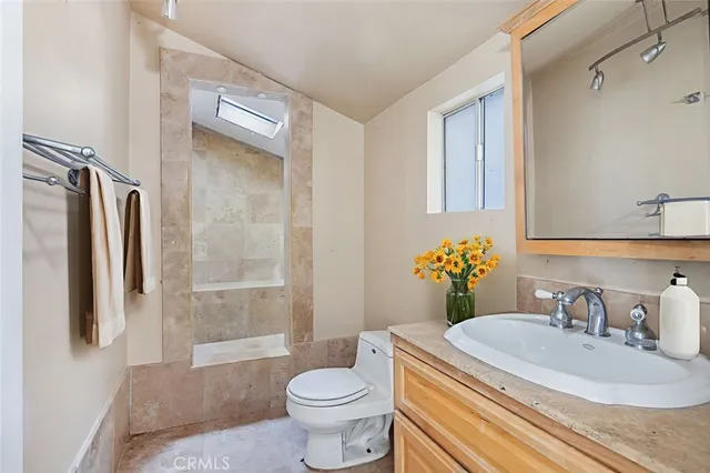 a view of an empty room with wooden walls