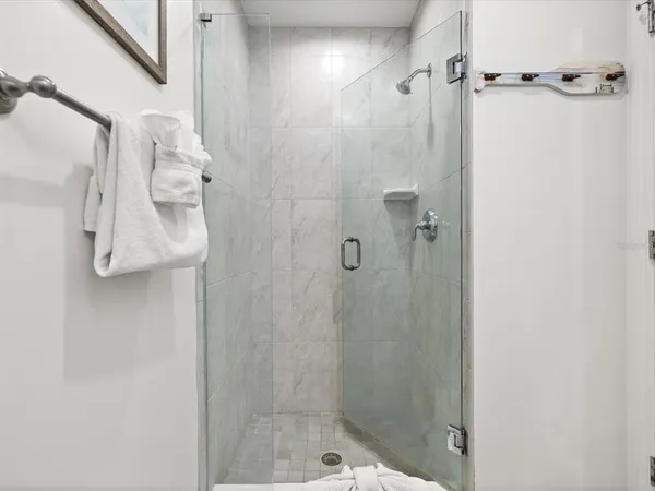 a view of a living room and dining room with furniture wooden floor