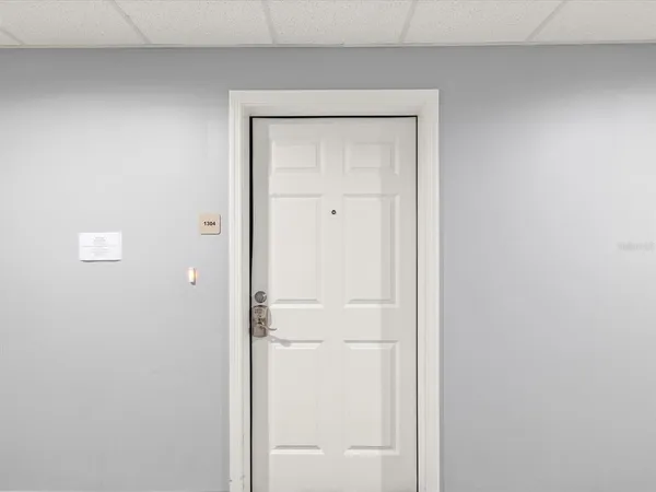 a view of building with outdoor space and lake view