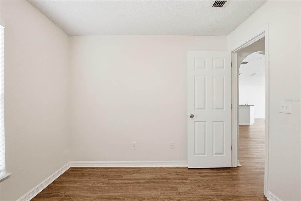 914 Stallion Way Valrico, FL 33594 - Photo 14 of 38 a view of room with wooden floor