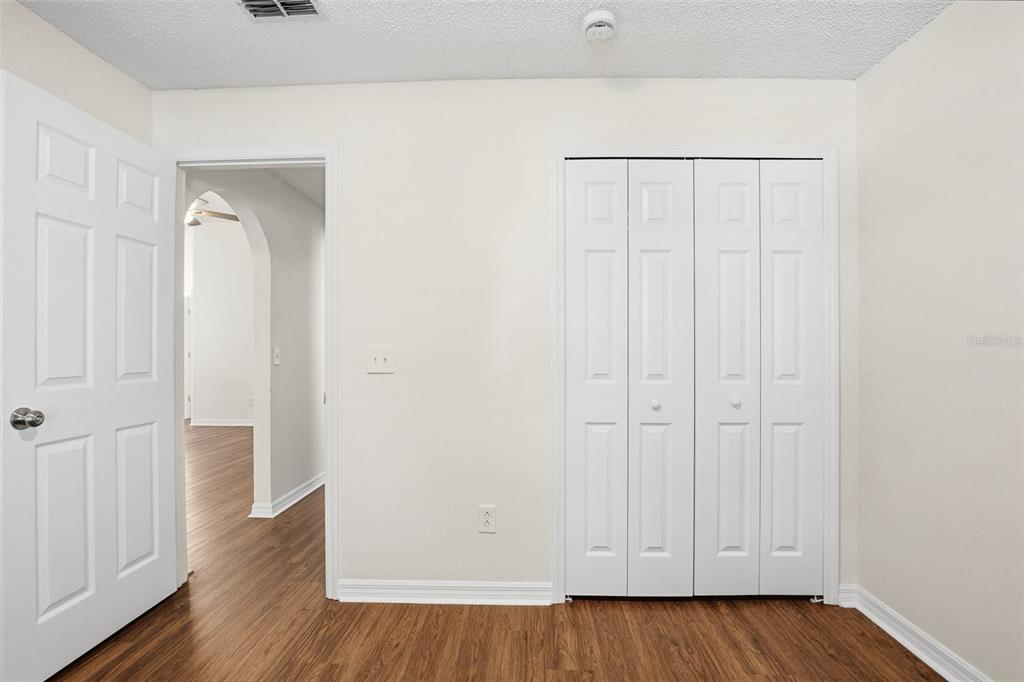 914 Stallion Way Valrico, FL 33594 - Photo 15 of 38 a view of a room with wooden floor
