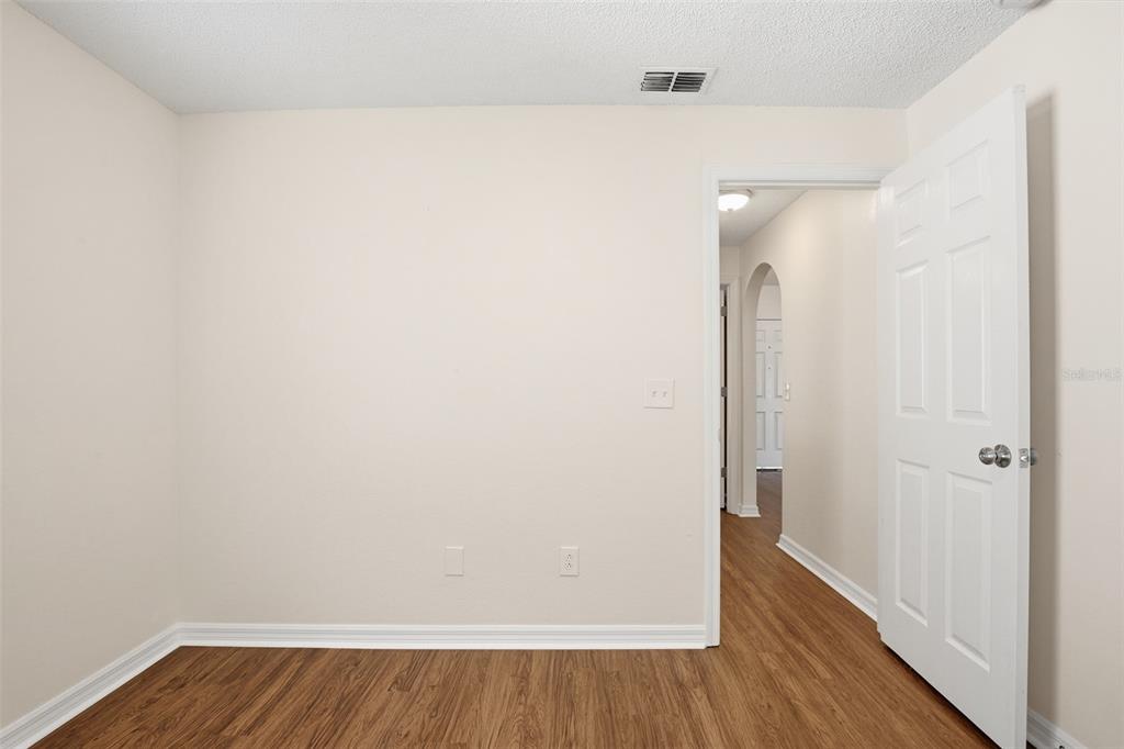 914 Stallion Way Valrico, FL 33594 - Photo 17 of 38 a view of a room with wooden floor
