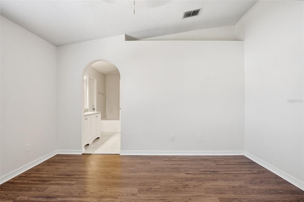914 Stallion Way Valrico, FL 33594 - Photo 28 of 38 a view of empty room with wooden floor
