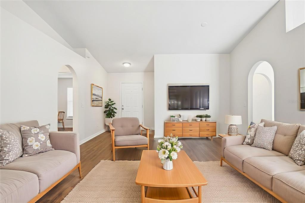 914 Stallion Way Valrico, FL 33594 - Photo 3 of 38 a living room with furniture and a flat screen tv