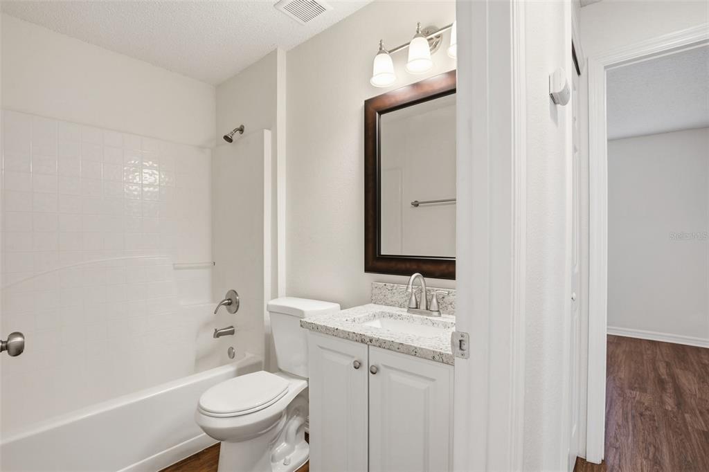 914 Stallion Way Valrico, FL 33594 - Photo 34 of 38 a bathroom with a sink toilet and shower