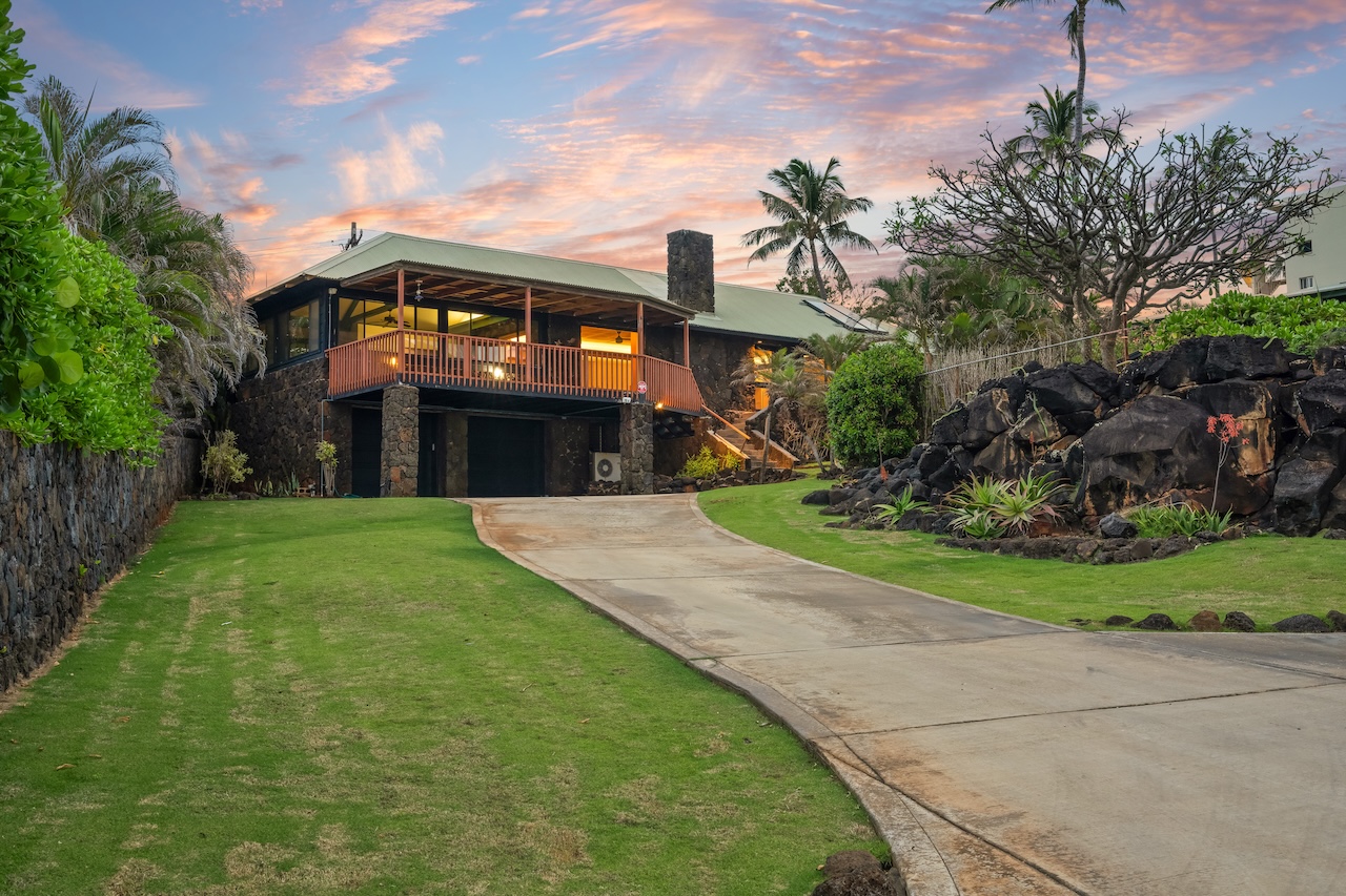 1801 Pe'e Road Koloa, HI 96756 - Photo 2 of 30 a front view of a house with a yard