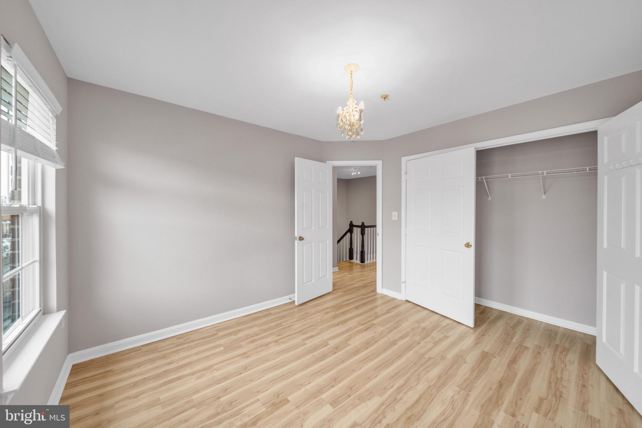 122 Longpoint Way Gaithersburg, MD 20878 - Photo 15 of 37 a view of empty room with wooden floor