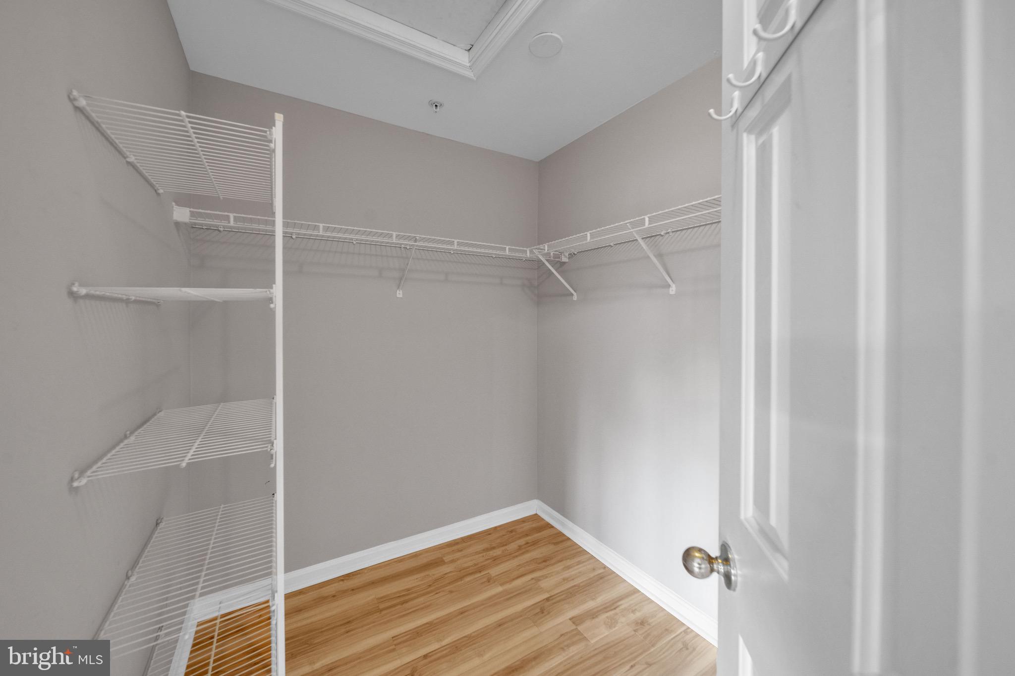 122 Longpoint Way Gaithersburg, MD 20878 - Photo 17 of 37 a view of an empty walk in closet