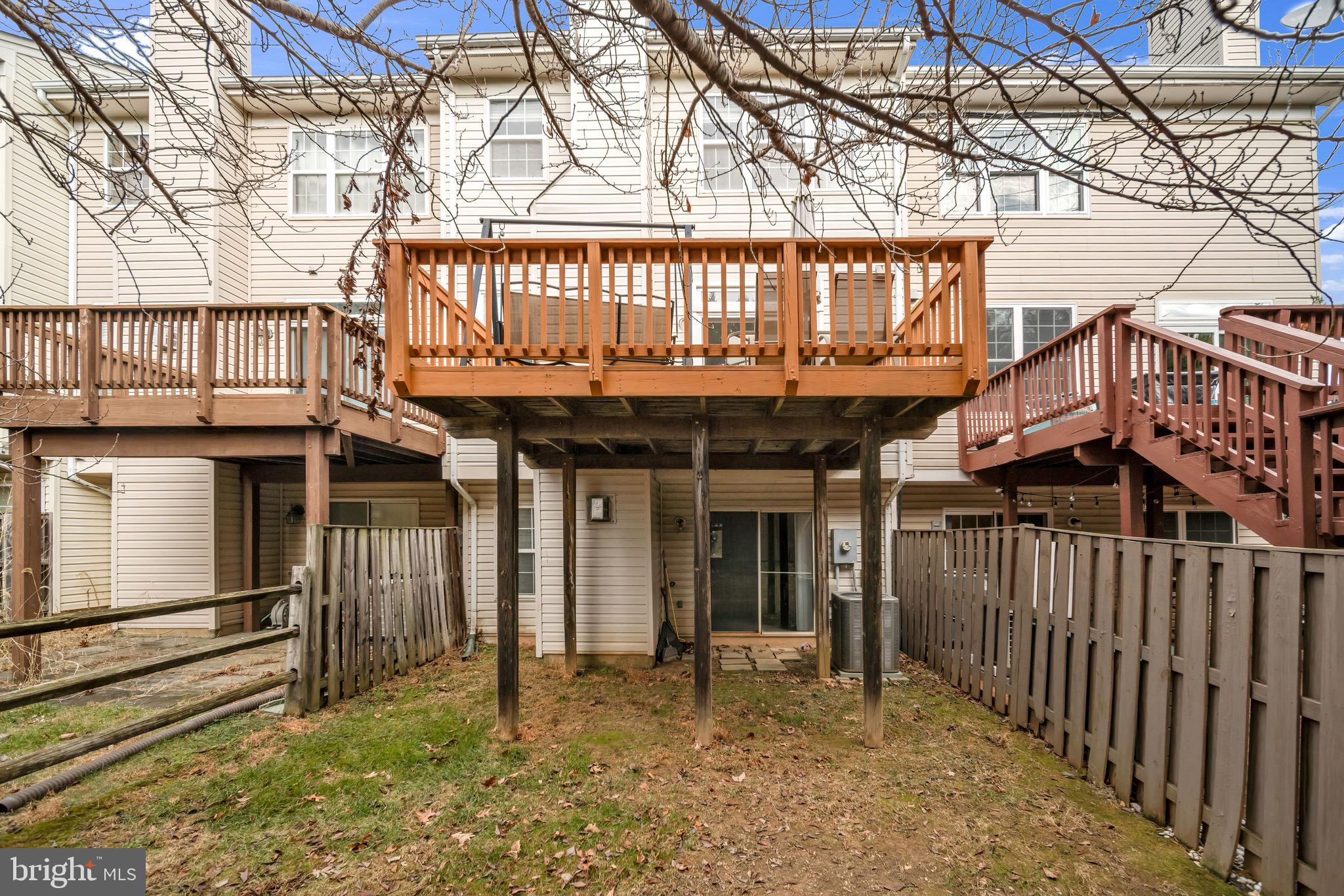 122 Longpoint Way Gaithersburg, MD 20878 - Photo 33 of 37 a front view of a house with a garden