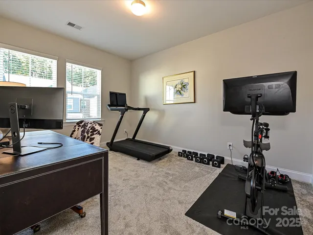 a room with furniture and a window