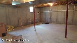 6234 Smithfield Road Smithfield, KY 40068 - Photo 16 of 23 8ft ceiling in basement, sump pump in corner with back up alarm for septic system