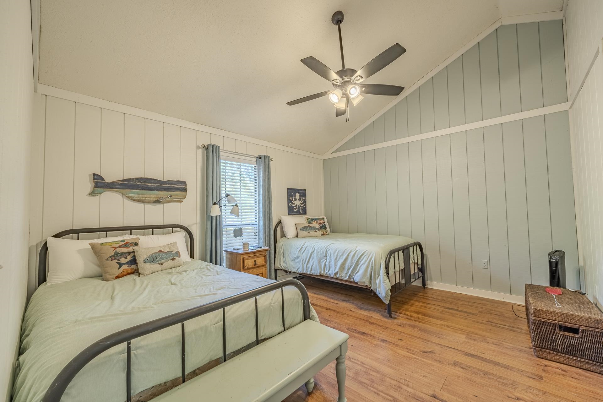 80 Contreau Road Counce, TN 38326 - Photo 17 of 28 a bedroom with two beds and a chandelier