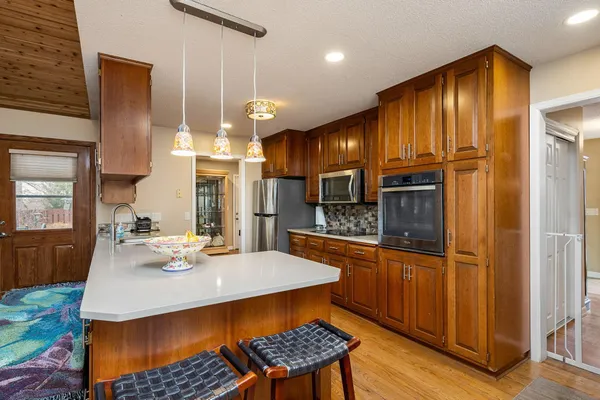 $524,900 | 5502 Regis Trail Northeast, Fridley, MN 55432