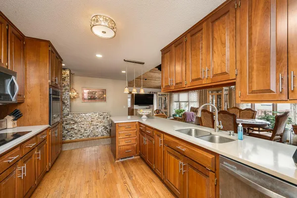 $524,900 | 5502 Regis Trail Northeast, Fridley, MN 55432
