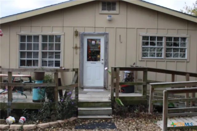 a front view of a house with glass windows