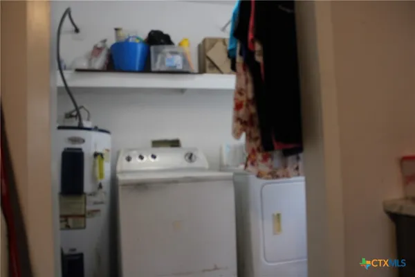 a bathroom with a sink a toilet and vanity