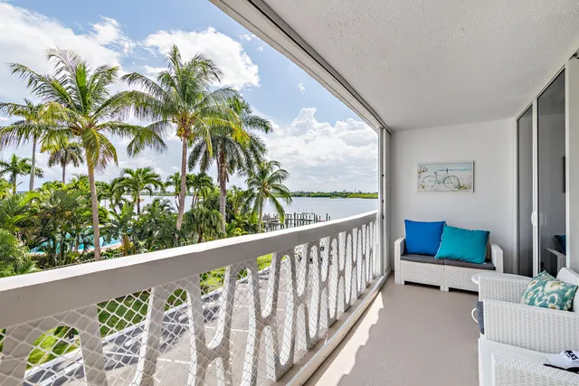 a view of balcony with furniture