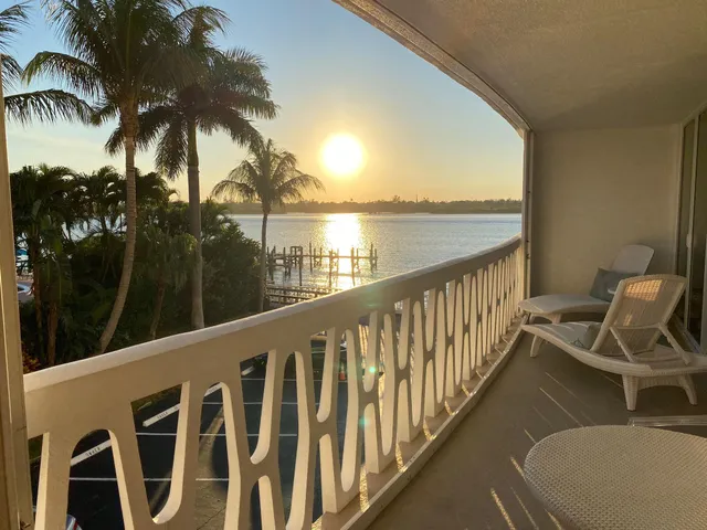 a view of balcony with furniture