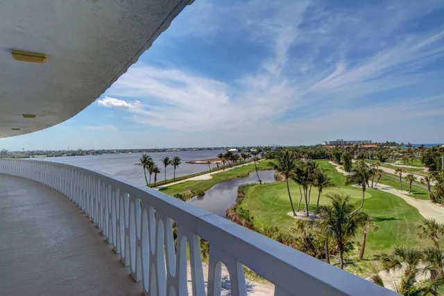 a view of a balcony with an ocean view