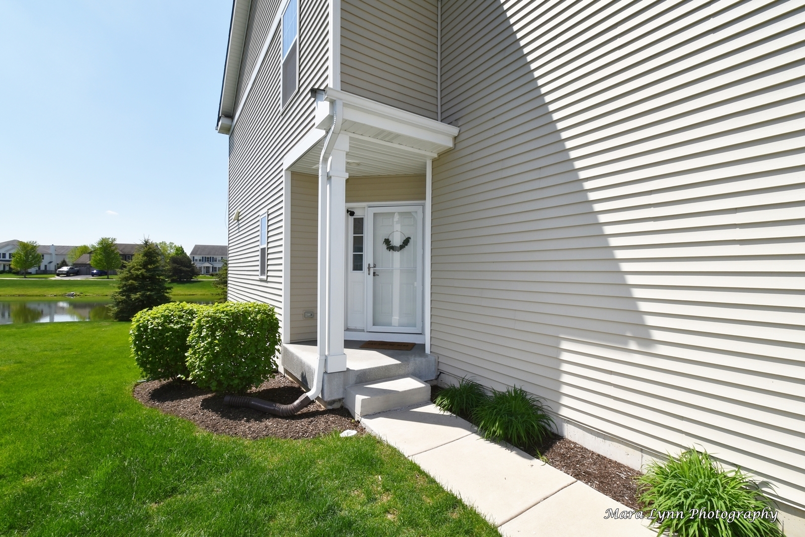 1127 Freedom Road Elburn, IL 60119 - Photo 2 of 29 a front view of a house with a yard