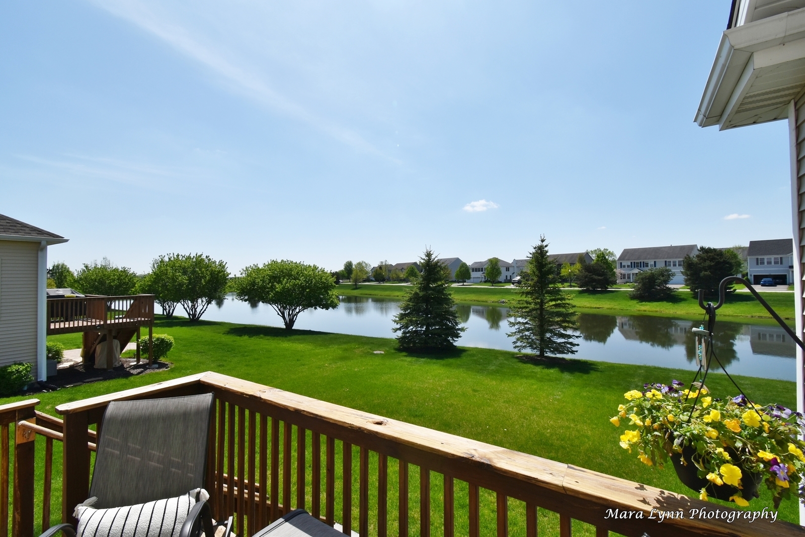 1127 Freedom Road Elburn, IL 60119 - Photo 24 of 29 a view of a two chairs in a backyard