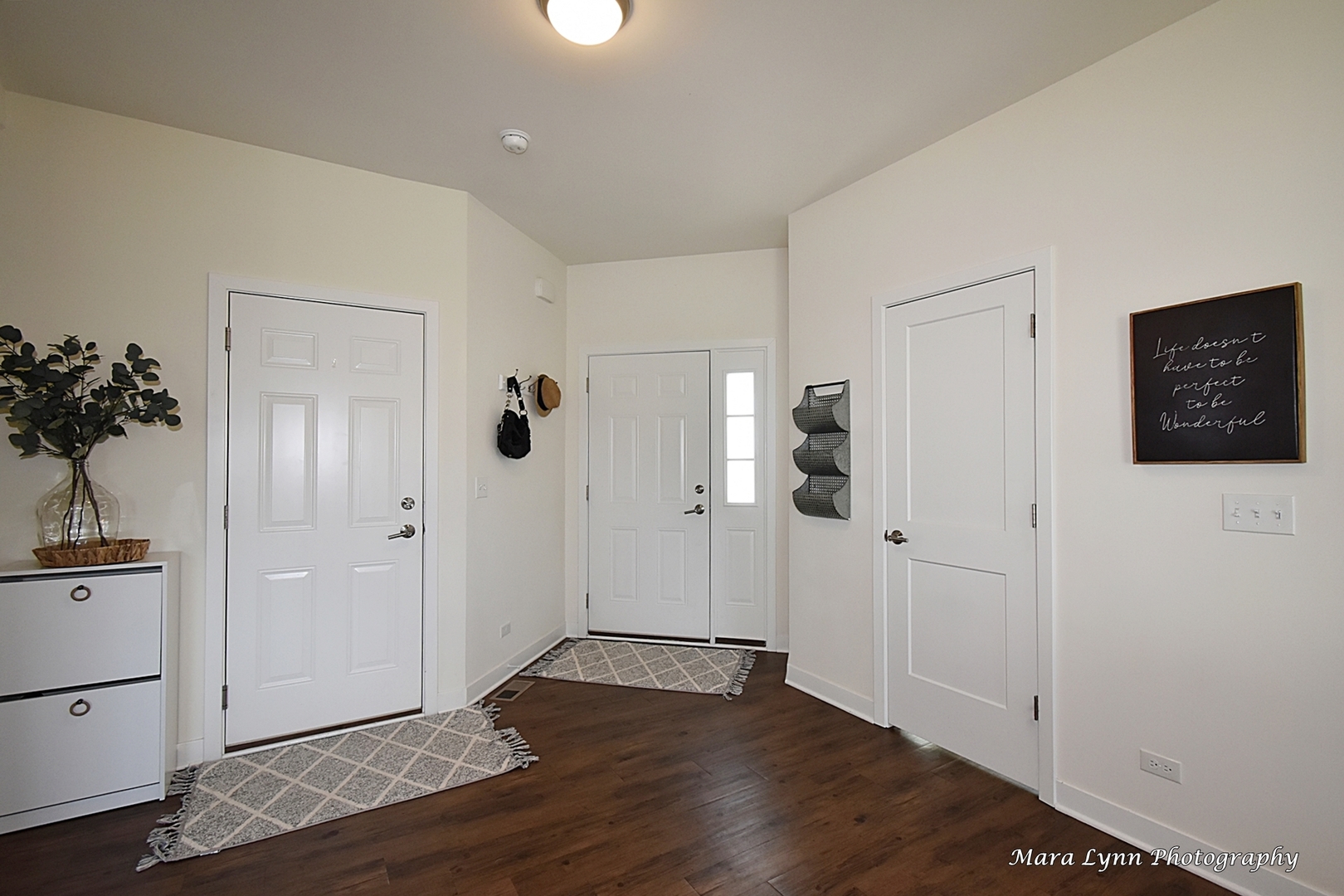 1127 Freedom Road Elburn, IL 60119 - Photo 3 of 29 a view of an empty room with wooden floor