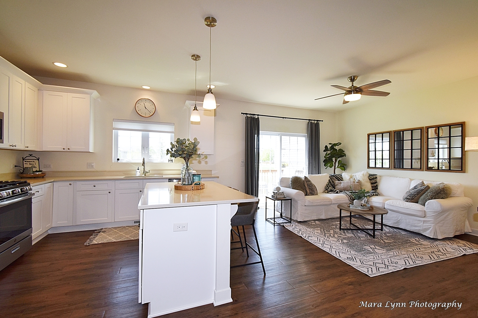 1127 Freedom Road Elburn, IL 60119 - Photo 4 of 29 a large kitchen with sink cabinets and wooden floor