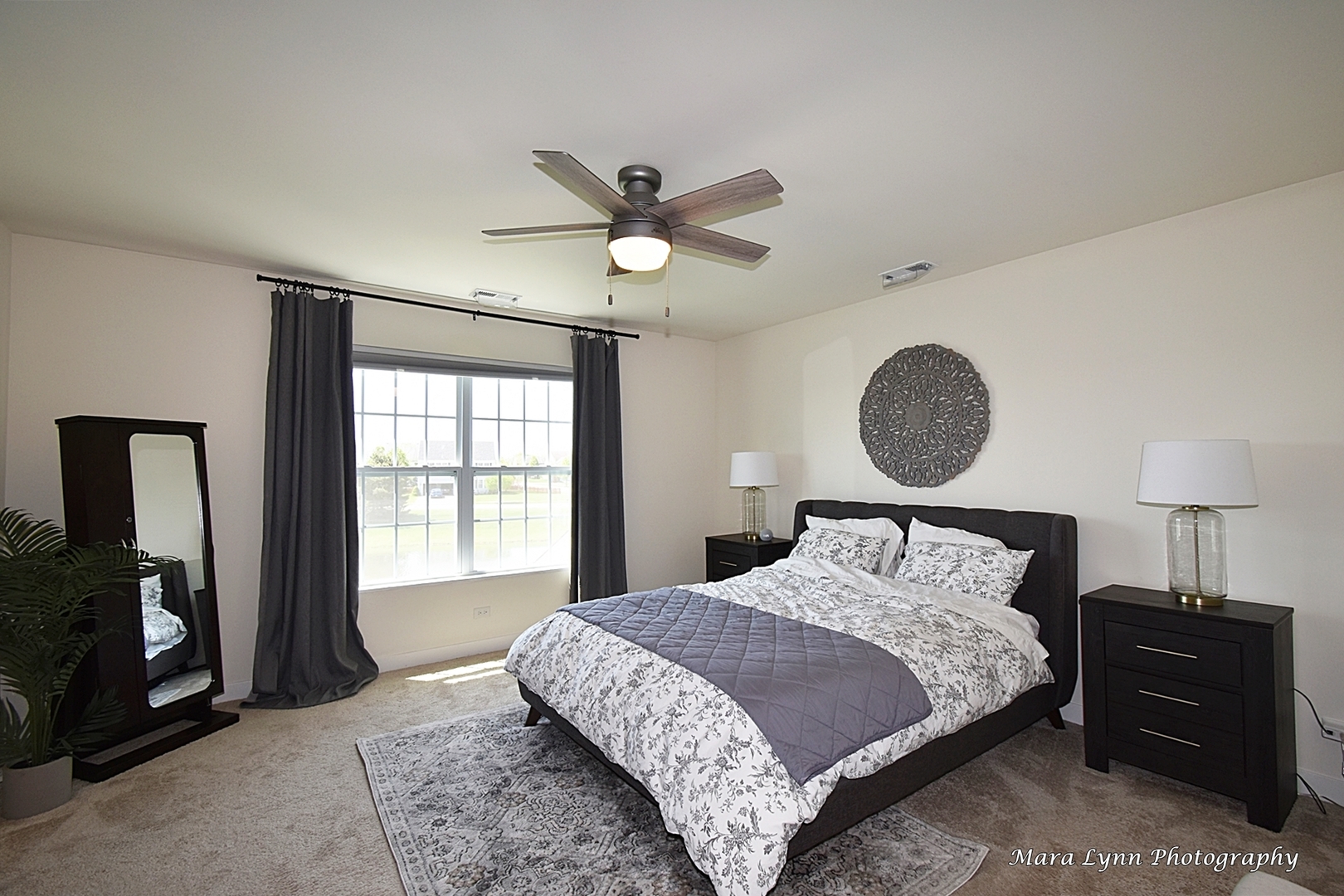 1127 Freedom Road Elburn, IL 60119 - Photo 10 of 29 a bedroom with a bed and wooden floor