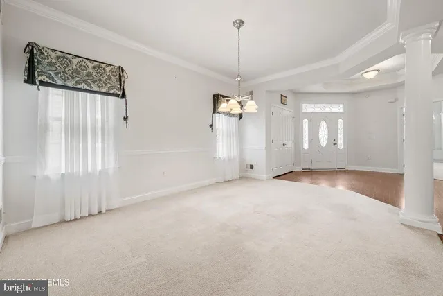 a view of an empty room and window