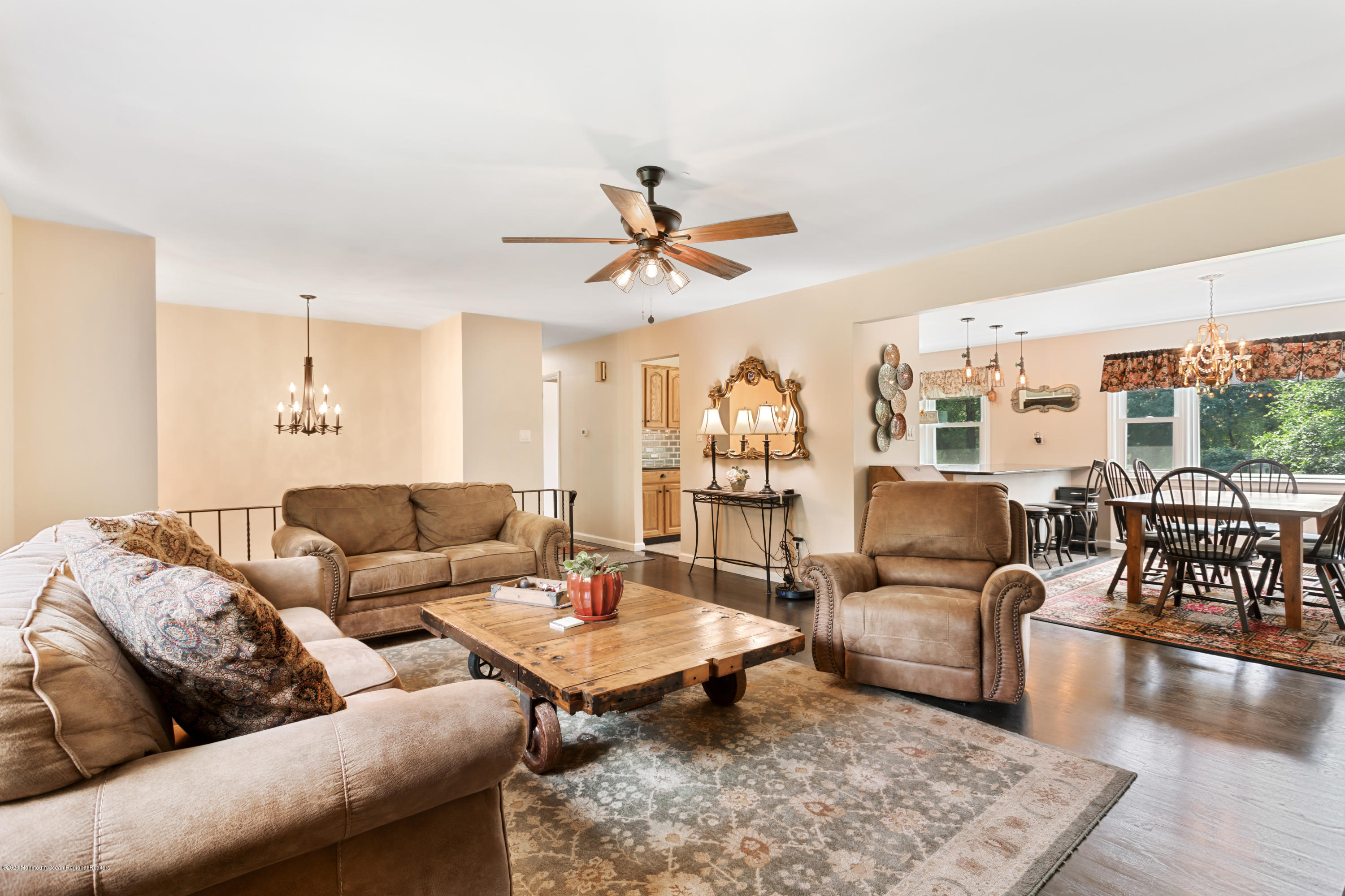 77 East Pleasant Grove Road Jackson, NJ 08527 - Photo 2 of 29 a living room with furniture ceiling fan and a rug