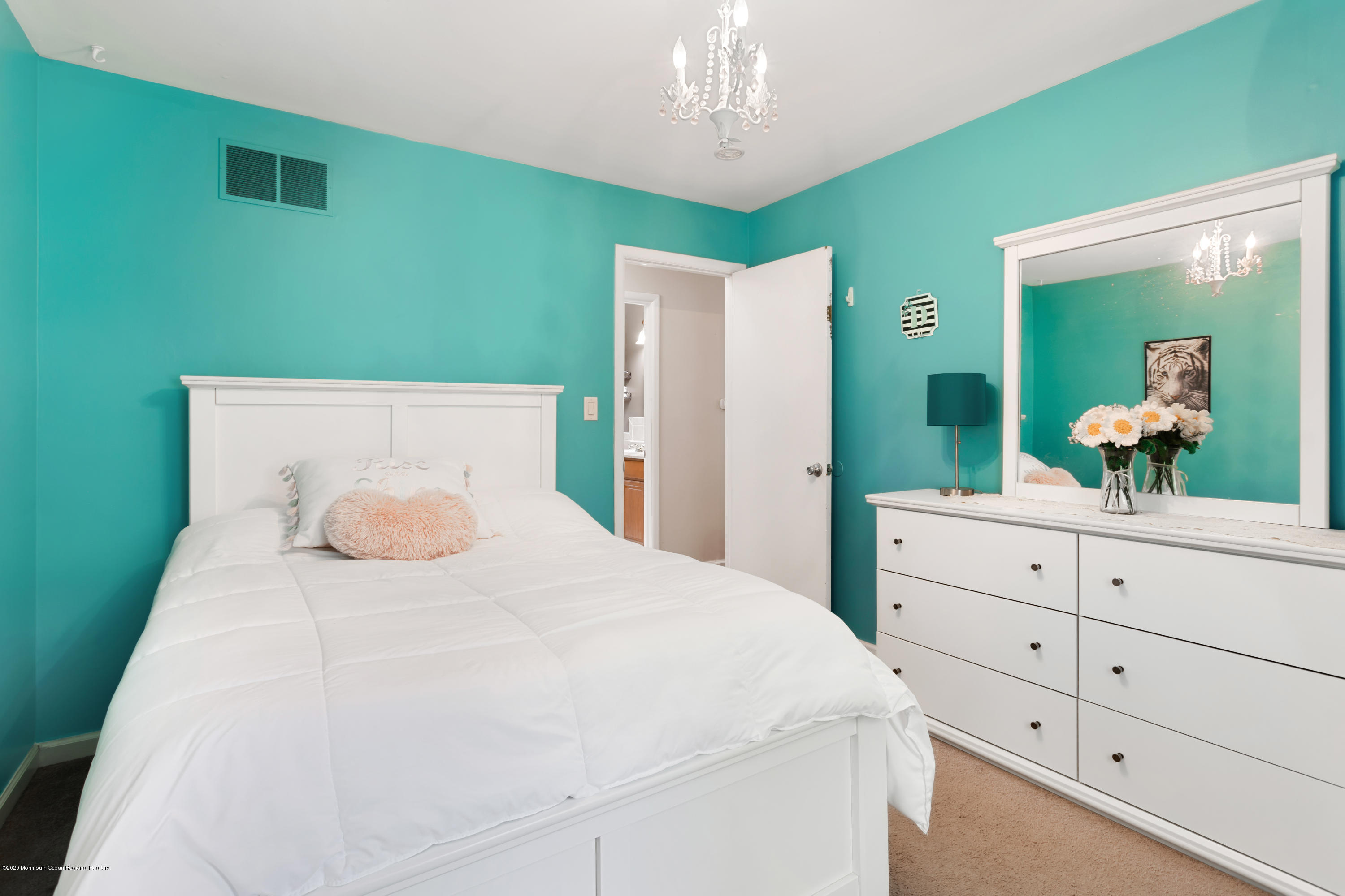 77 East Pleasant Grove Road Jackson, NJ 08527 - Photo 15 of 29 a bedroom with a bed and a dresser