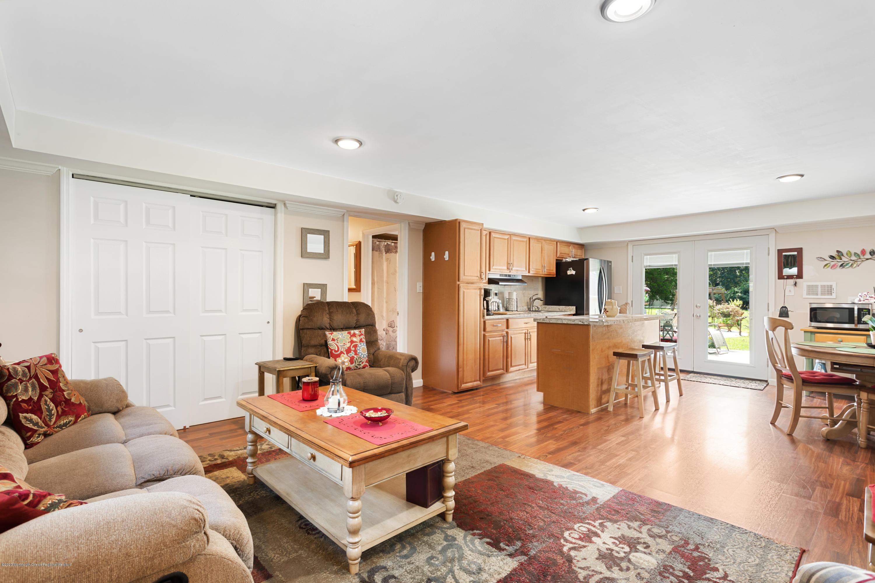77 East Pleasant Grove Road Jackson, NJ 08527 - Photo 17 of 29 a living room with furniture and wooden floor
