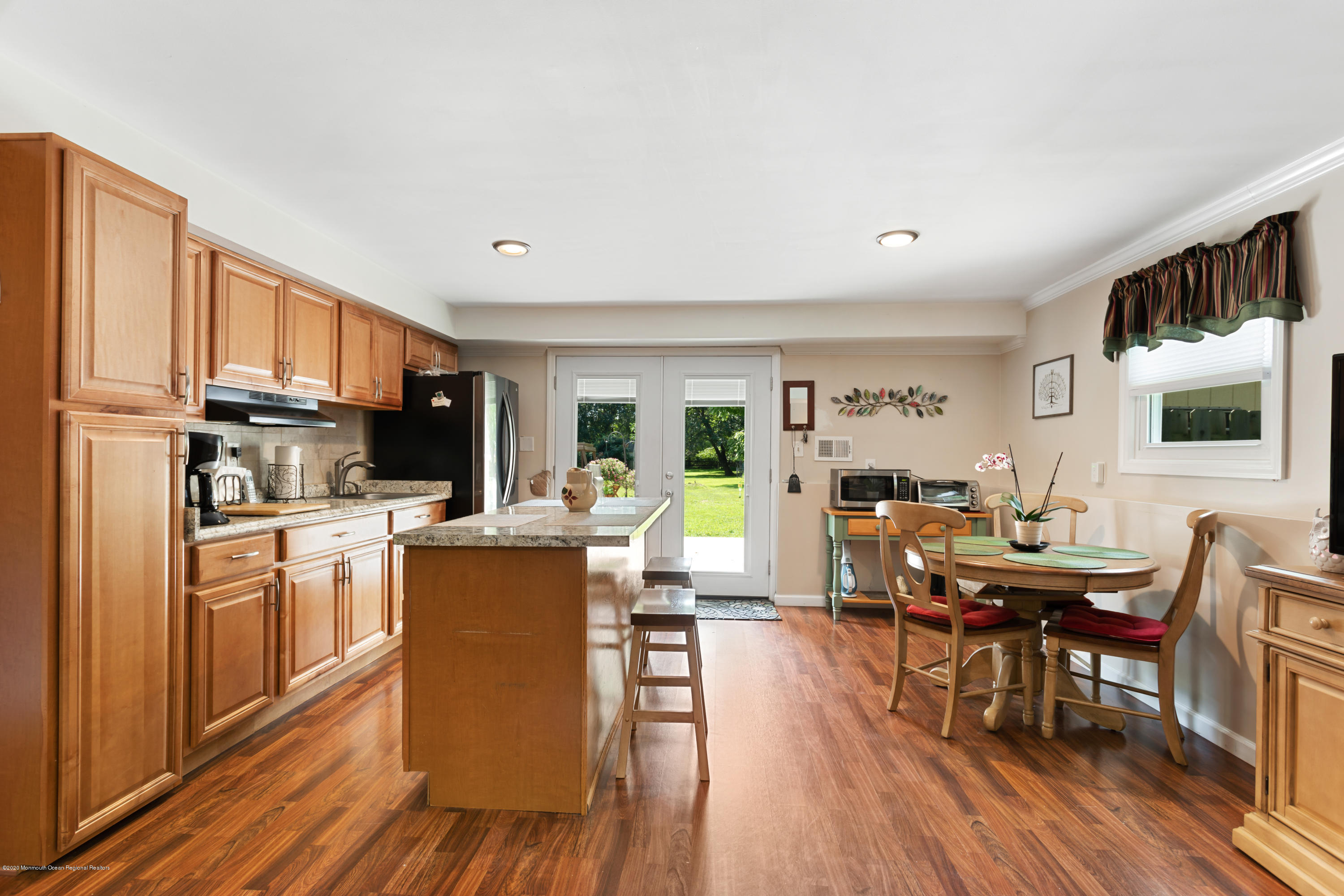 77 East Pleasant Grove Road Jackson, NJ 08527 - Photo 20 of 29 a view of kitchen with cabinets and wooden floor