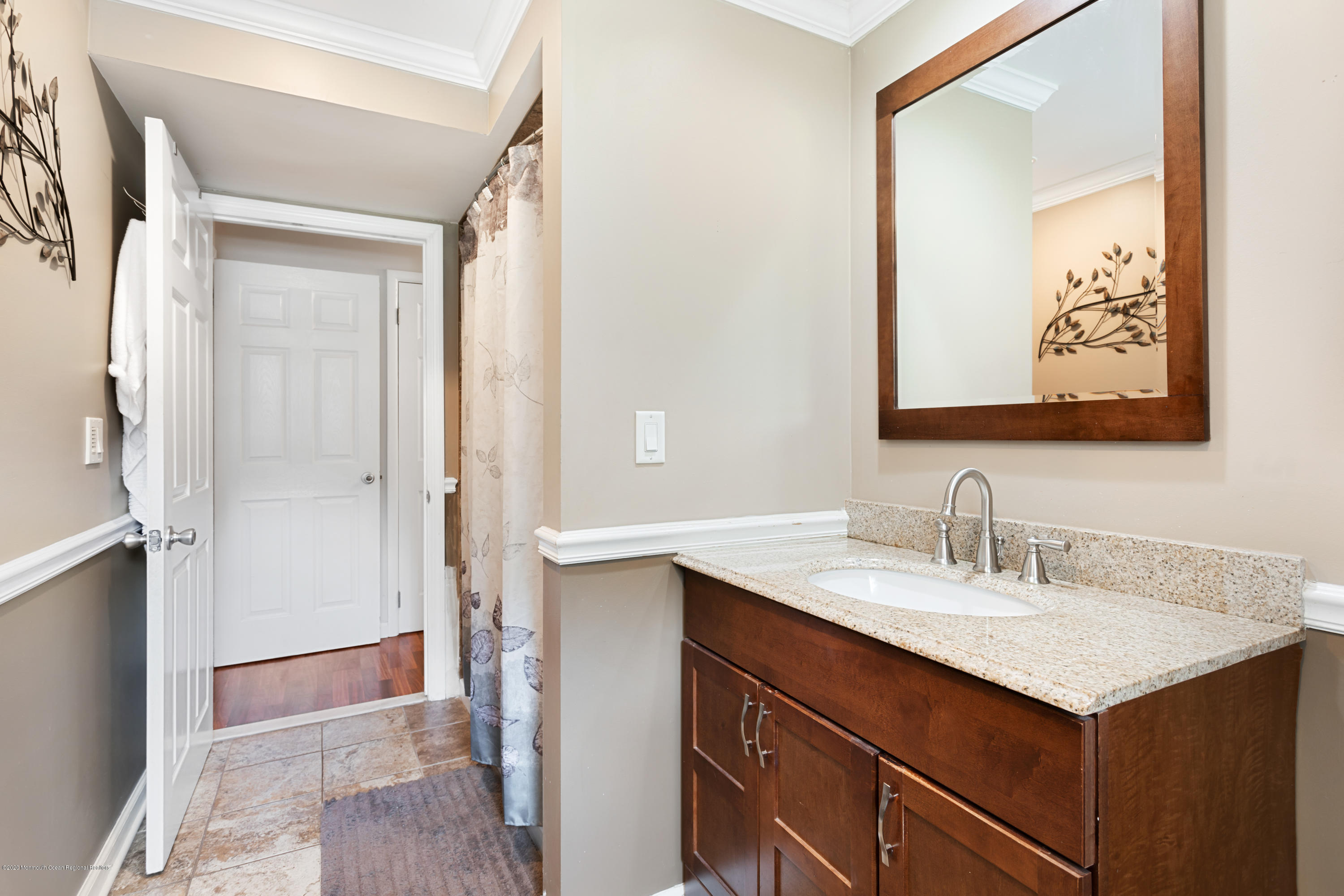 77 East Pleasant Grove Road Jackson, NJ 08527 - Photo 24 of 29 a bathroom with a sink and a mirror