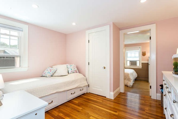 57 Emerson Road Needham, MA 02492 - Photo 13 of 19 a bedroom with a bed and a window